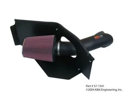 A k & n air intake is mounted to the side of a car.