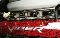 A red and black car engine with the word viper written on it.