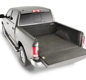 A truck with its bed in the back