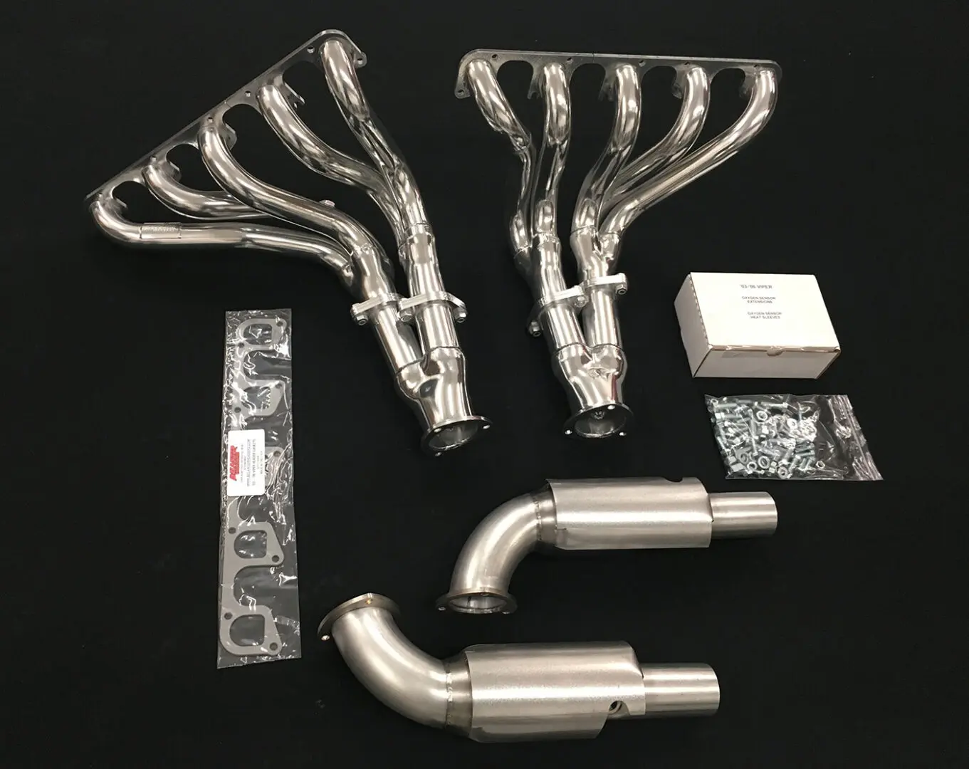 A set of exhaust pipes and accessories for a car.