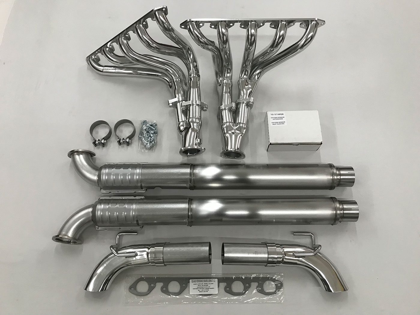 A set of exhaust pipes and headers for a car.