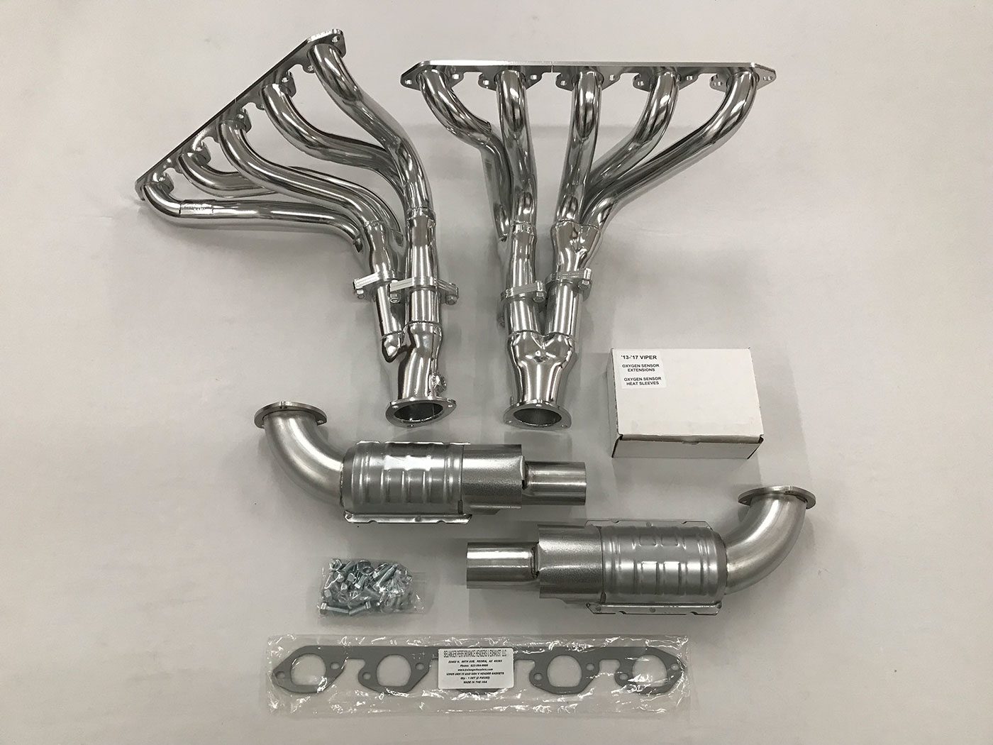 A set of exhaust pipes and manifolds for the car.