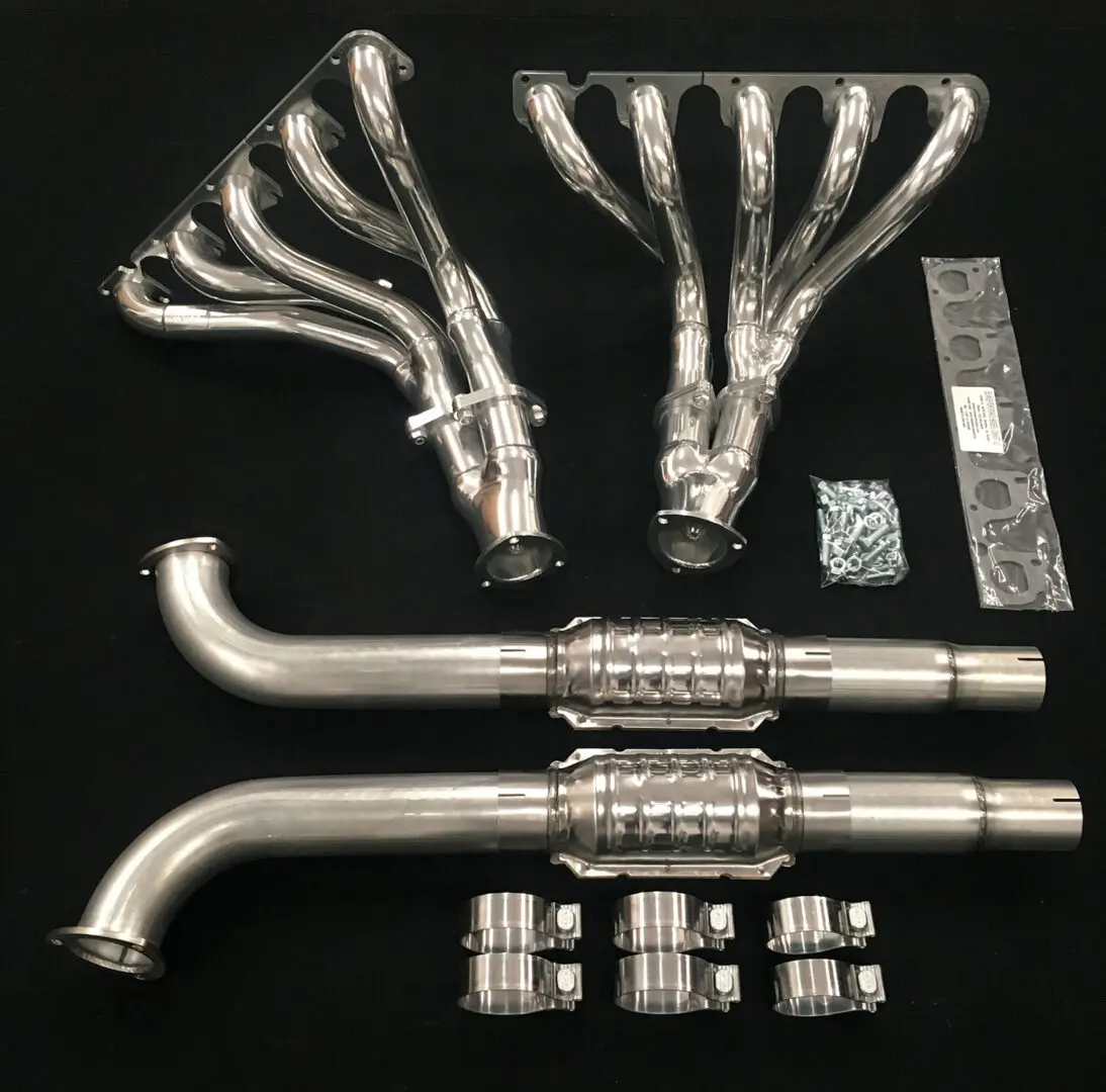 A set of exhaust pipes and manifolds for a car.