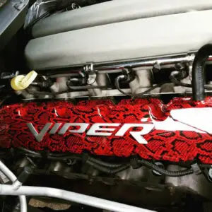 A red and black car engine with the word viper on it.