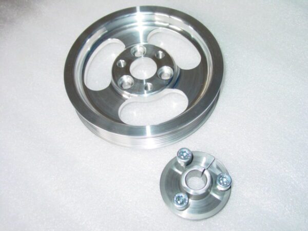 A silver metal wheel and a small metal wheel.