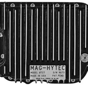 A black and white photo of an engine oil pan.