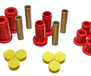 A group of red and yellow bushings, and other parts.