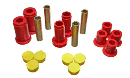 A group of red and yellow bushings, and other parts.