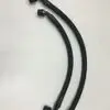A pair of black hose with a handle on the end.