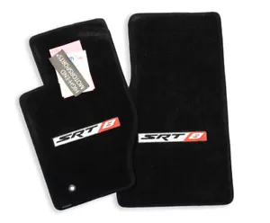 A set of black floor mats with srt logo.