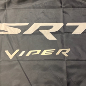 A black and white picture of the srt viper logo.