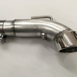 A chrome exhaust pipe on top of a white table.