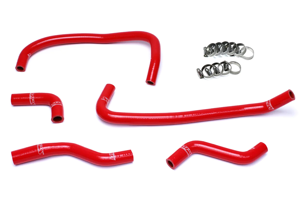 A set of red hoses and clamps for an engine.