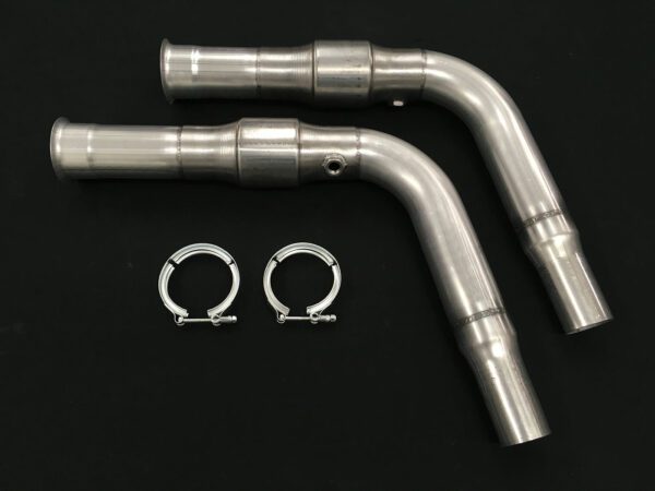 A pair of exhaust pipes with two clamps attached.