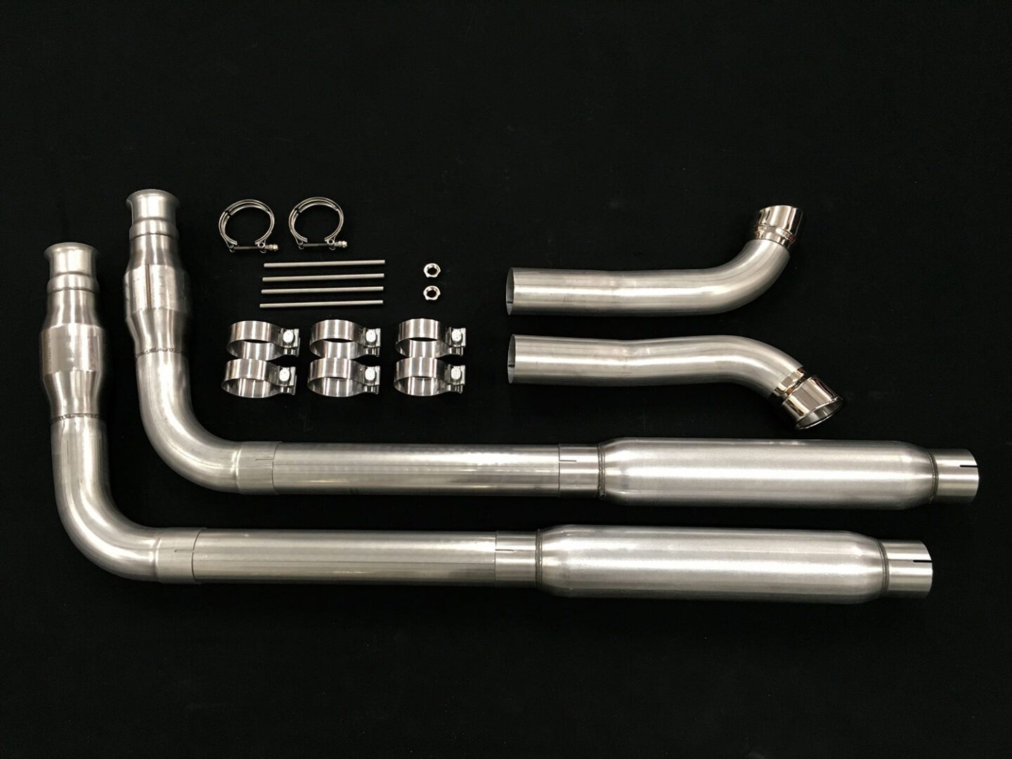 A pair of pipes and other parts are shown.