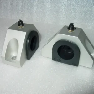 A pair of white and black plastic blocks.