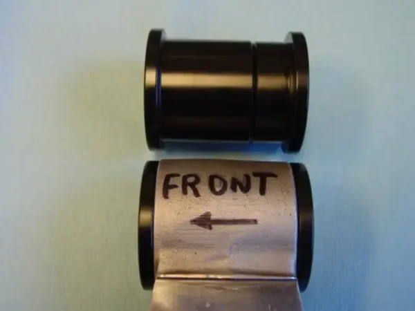 A roll of toilet paper with the word " front " written on it.