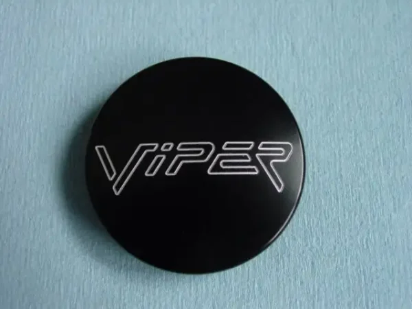 A black button with the word " viper ".