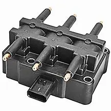 A black plastic block with four wires attached to it.